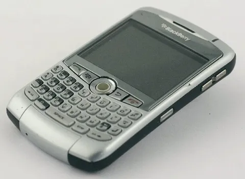 A silver BlackBerry Curve in a museum collection in Milan