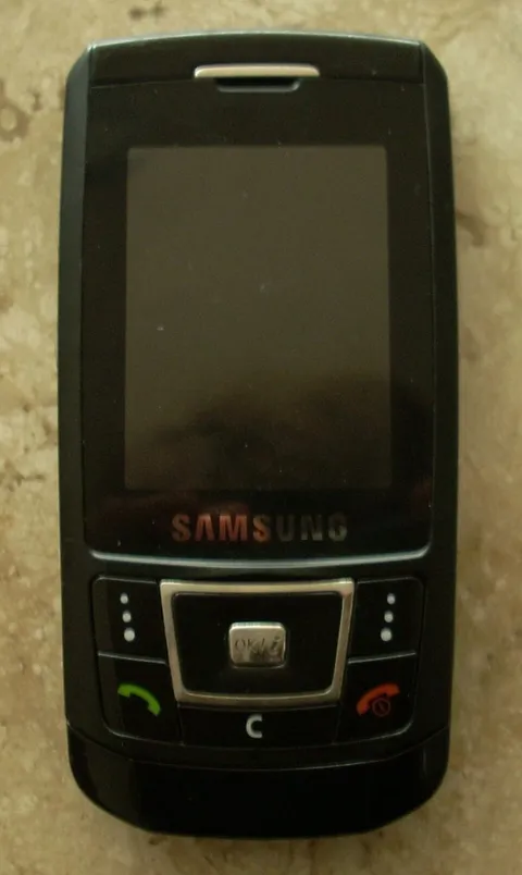 A black Samsung D900 slider, closed